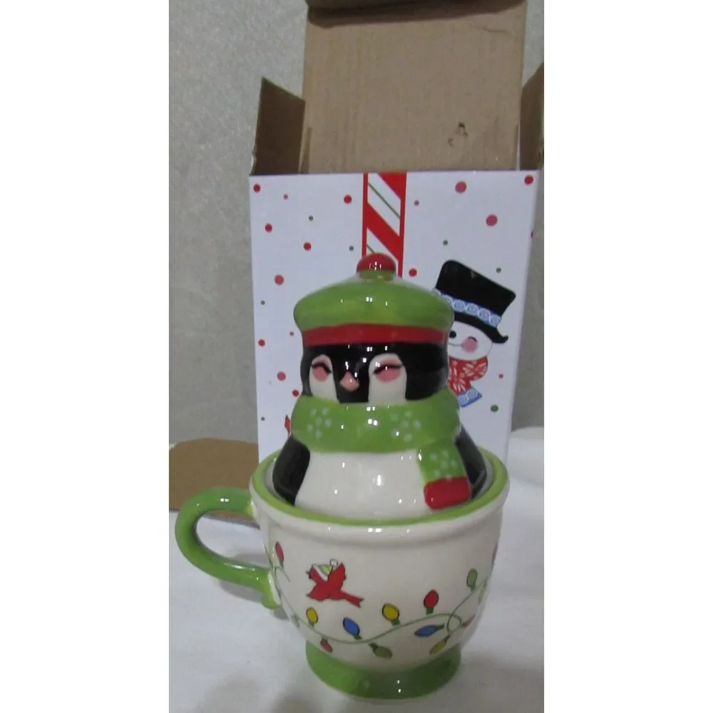 Salt and pepper shakers penguin in a teacup Temptations new in box green